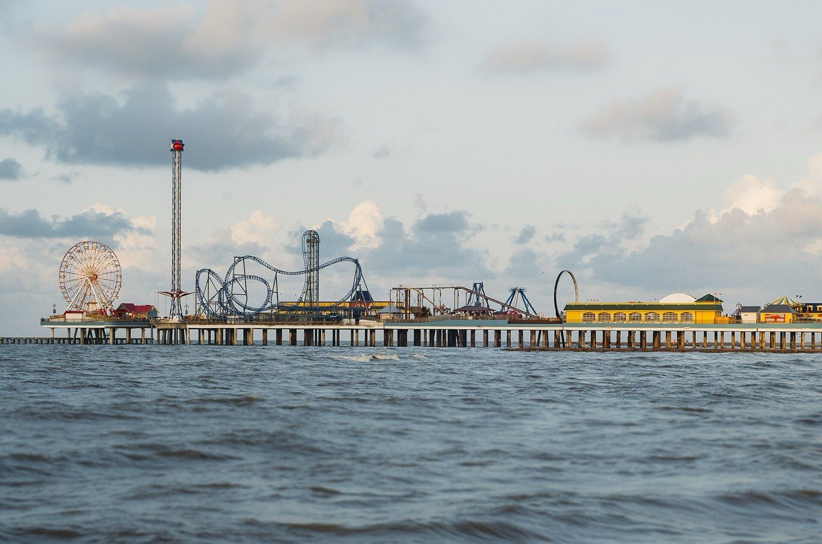 Pleasure Pier amusement rides over the Gulf on the Galveston Seawall